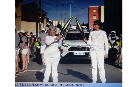 Isabelle a la flamme olympique entre les mains !